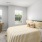 bedroom with bed and windows