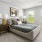 bedroom with bed and windows