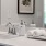bathroom with sink and large mirror