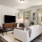 living room with a couch, coffee table, and tv
