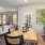 dining room with a wood table and chairs with view of living room