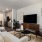 living room with a couch coffee table and tv