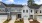 front of townhomes with grass and sidewalk