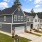 front of townhomes with grass and sidewalk