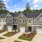 front of townhomes with grass and sidewalk