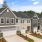 front of townhomes with grass and sidewalk